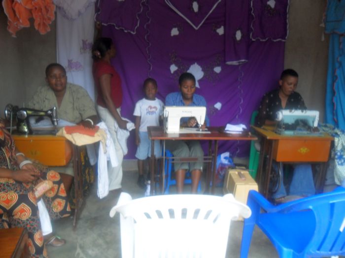 helping-widows-with-aids-in-Tanzania-logo-tailoring-work.